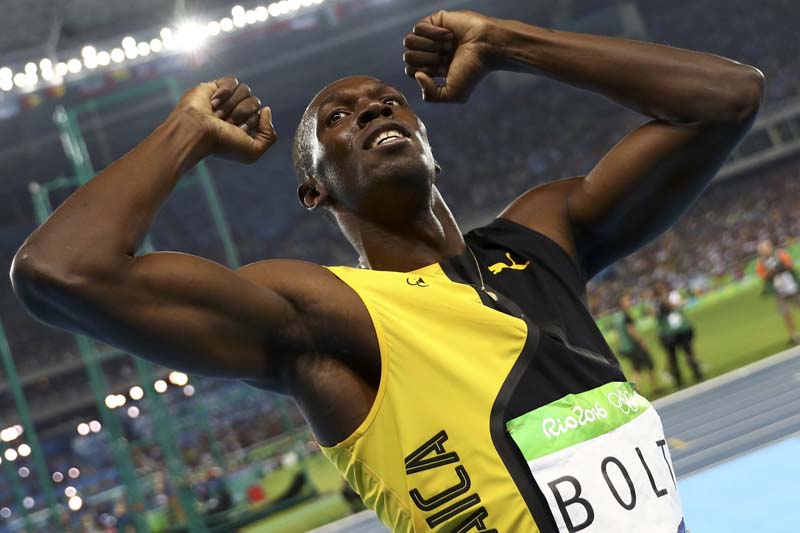 Usain Bolt of Jamaica celebrates winning the gold in the Men's 100m Final at the Olympic Stadium in Rio de Janeiro, Brazil, on Sunday, August 14, 2016. Photo: Reuters