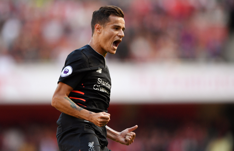 Liverpool's Philippe Coutinho celebrates scoring their first goaln. Photo: Reuters