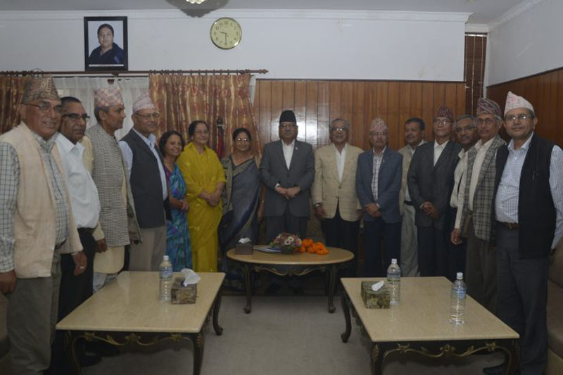 Former lawmakers pose for a photograph with Prime Minister Pushpa Kamal Dahal, in Kathmandu, on Wednesday, August 31, 2016. Photo: PM's Secretariat