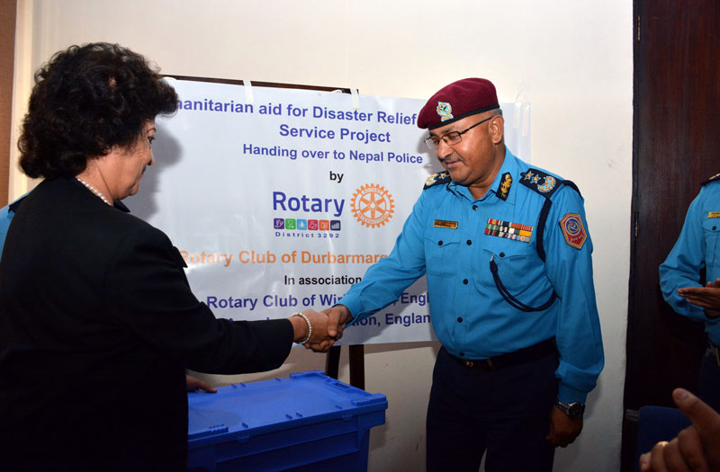 IGP Upendra Kant Aryal shakes hands with the Rotary District Governor Jaya Shah as the Club hands over disaster response kits to Nepal Police amid a programme on Friday, August 5, 2016. Photo: Nepal Police