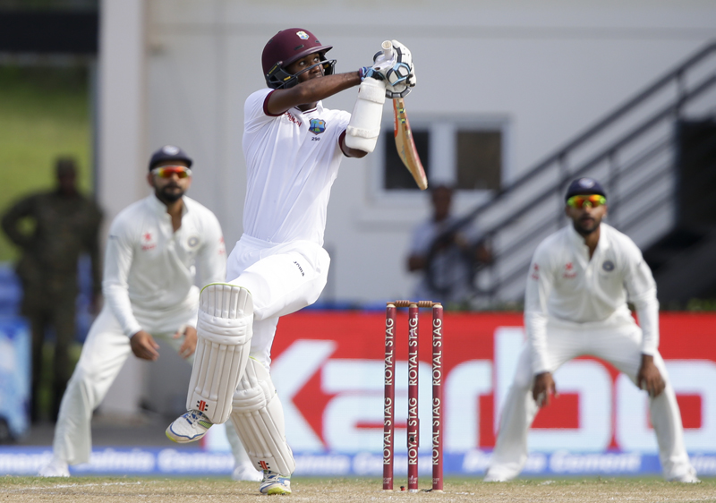 West Indies' Kraigg Brathwaite plays a shot during the third session of day two of the third cricket Test match against India at the Daren Sammy Cricket Ground in Gros Islet, St. Lucia, Wednesday, August 10, 2016. Photo: AP