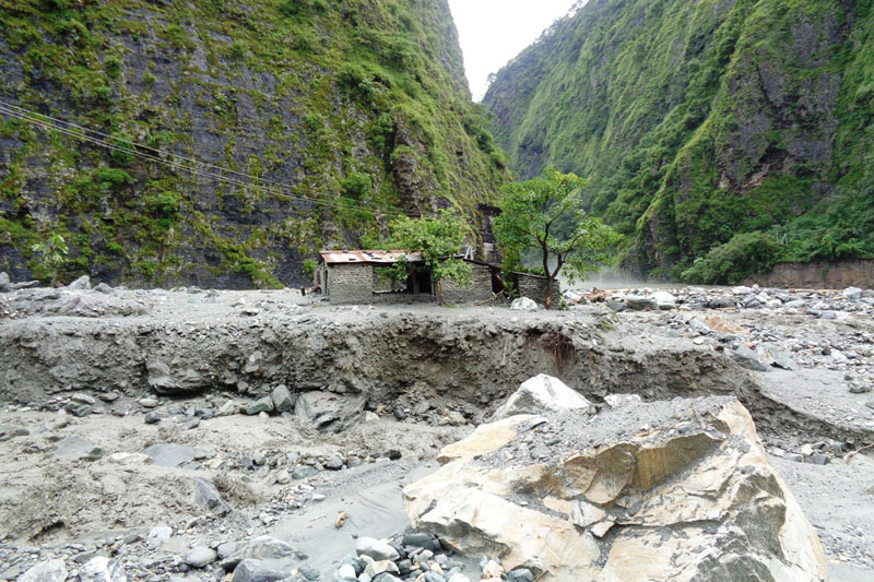 A view of the remaining wrecked houses after floods wreak havoc on the village of Begkhola in Beg-6 of Myagdi district, on Thursday, September2. 11 houses were swept away by floods in the Khahare River on Thursday night. Photo: RSS