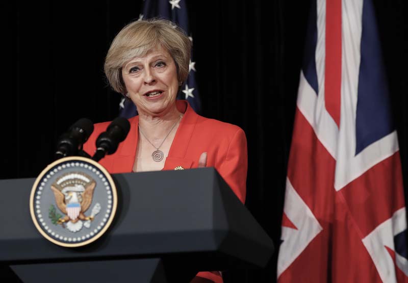 British Prime Minister Theresa May talks to media with US President Barack Obama after their bilateral meeting in Hangzhou in eastern China's Zhejiang province, on Sunday, September 4, 2016, alongside the G20. Photo: AP