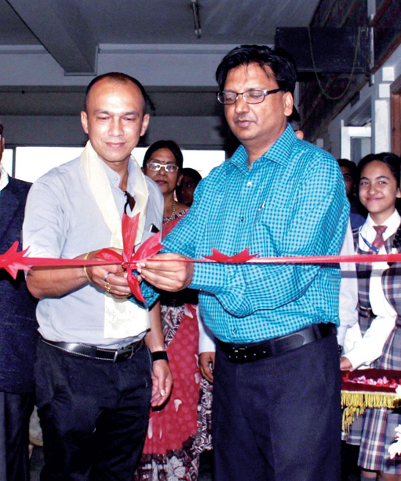 Former national football team skipper Hari Khadka and DAV School Chairman Anil Kedia (right) inaugurating the Open Gym in Lalitpur on Sunday.