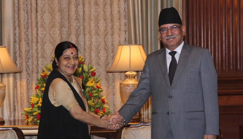 Prime Minister Pushpa Kamal Dahal shakes hands with External Affairs Minister of India Sushma Swaraj in New Delhi on Friday, September 16, 2016. 