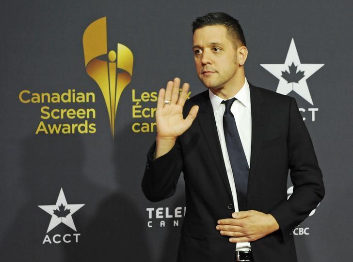 TV personality George Stroumboulopoulos arrives during the Canadian Screen Awards in Toronto March 3, 2013.  REUTERS/Jon Blacker/Files