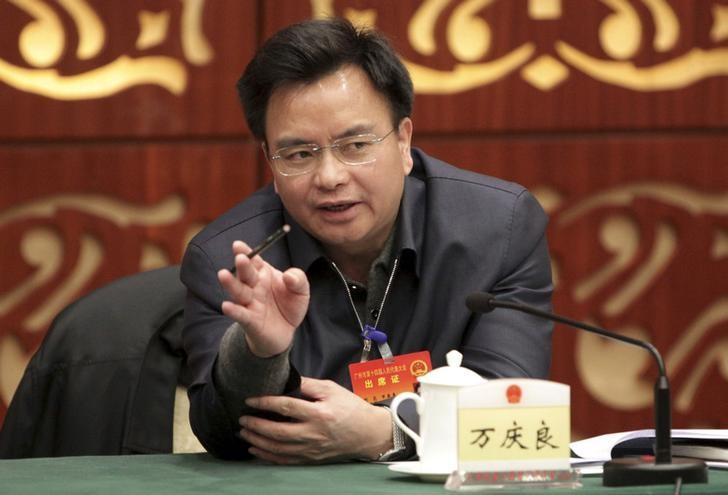 Wan Qingliang, former Communist Party boss of Guangzhou, gestures as he speaks at a meeting in Guangzhou, February 18, 2014. REUTERS/Stringer/Files