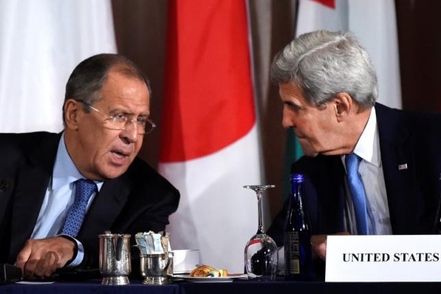 U.S. Secretary of State John Kerry speaks with Russian Foreign Minister Sergei Lavrov during the International Syria Support Group meeting at the Palace Hotel in Manhattan, New York, U.S., September 22, 2016.  REUTERS/Darren Ornitz