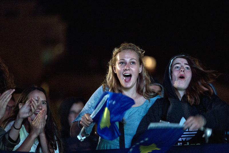 Kosovo supporters jubilate in the Kosovo capital, Pristina, while watching the World Cup 2018 Group I qualifying soccer match Finland vs Kosovo, on Monday, September 5, 2016. Kosovo earned a draw in their first competitive debut. Photo: AP