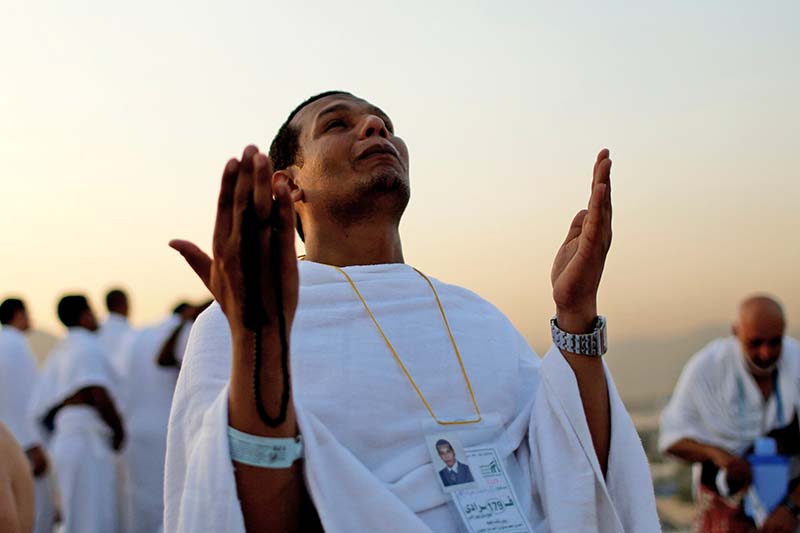 A Muslim pilgrim prays on Mount Mercy on the plains of Arafat during the annual haj pilgrimage, outside the holy city of Mecca, Saudi Arabia, on September 11, 2016. Photo: Reuters