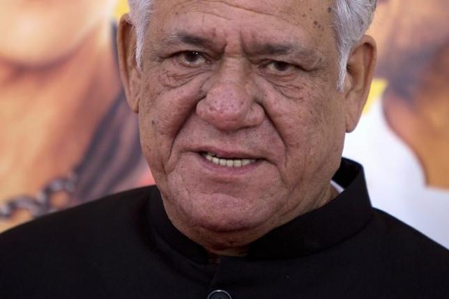 Actor Om Puri arrives for the world premiere of the film 'The Hundred-Foot Journey' in the Manhattan borough of New York August 4, 2014. REUTERS/Carlo Allegri/File Photo
