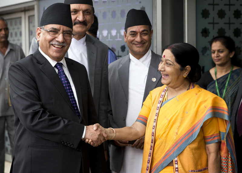 Indian Minister for External Affairs Sushma Swaraj (right) receives Nepali Prime Minister Pushpa Kamal Dahal as he arrives in New Delhi, India, on Thursday, September 15, 2016. Dahal is on a four-day visit to India. Photo: AP