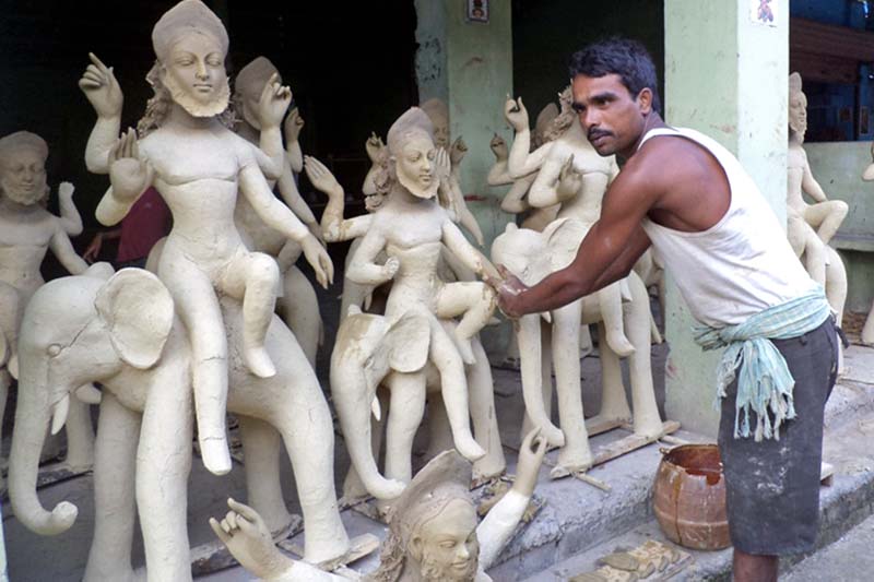 A sculptor displays his sculptures he made for the upcoming Bishwokarma Puja, in Topa of Saptari district, on Tuesday, September 13, 2016. Photo: RSS