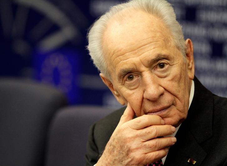Former Israeli president Shimon Peres attends  a press conference at the European Parliament in Strasbourg, in this March 12, 2013 file photo. REUTERS/Jean-Marc Loos/Files