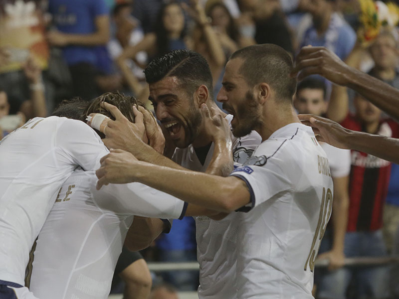 Italian players celebrate after the score against Israel during the World Cup Group G qualifying soccer match in Haifa, Israel, on Monday, September 5, 2016. Photo: AP