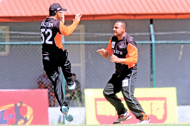 Colors X-Factorsu0092 Sanjam Regmi (right) celebrates with Rajesh Pulami after taking an wicket against Jagadamba Rhinos during the Wai Wai Everest Premier League matches in Kathmandu on Friday, September 30, 2016. Photo: THT