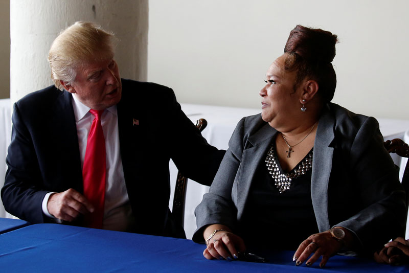 Republican presidential nominee Donald Trump and Shalga Hightower, mother of Iofemi Hightower who was killed in 2007, talk during a meeting in Philadelphia, Pennsylvania, US, on September 2, 2016. Photo: Reuters