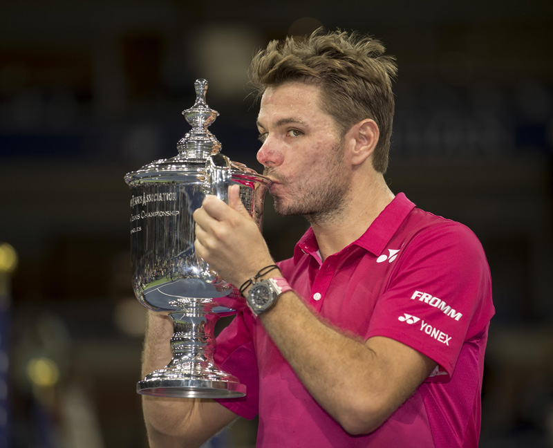 Stan Wawrinka (SUI) poses with the trophy after his match against Novak Djokovic (SRB) on day fourteen of the 2016 US Open tennis tournament at USTA Billie Jean King National Tennis Center. Mandatory Credit: Susan Mullane-USA TODAY Sports