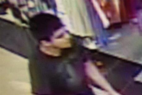 This video image provided by Skagit County Department of Emergency Management shows a suspect wanted by the authorities regarding a shooting at the Cascade Mall in Burlington, Wash., Friday, Sept. 23, 2016.  AP