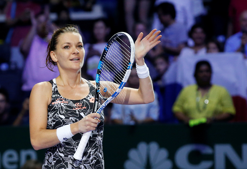 Agnieszka Radwanska of Poland celebrates after defeating Karolina Pliskova of the Czech Republic. Photo: Reuters
