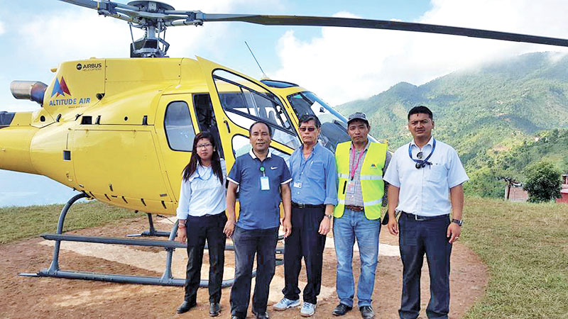 Officials and board of directors of Altitude Air with newly bought Airbus helicopter in Manakamana after a successful demonstration flight. Photo courtesy:  Altitude Air