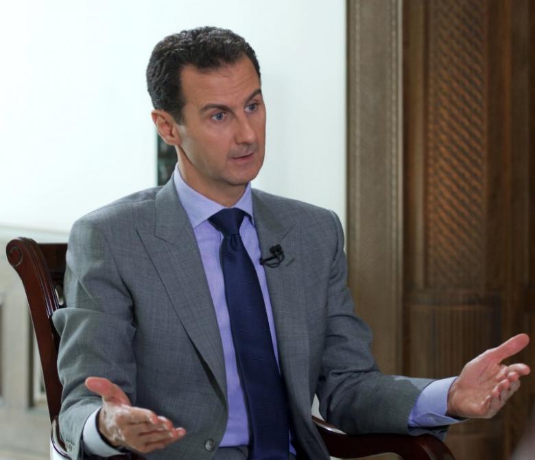 Syria's President Bashar al-Assad speaks during an interview with Russian tabloid Komsomolskaya Pravda, in this handout picture provided by SANA on October 14, 2016. SANA/Handout via REUTERS
