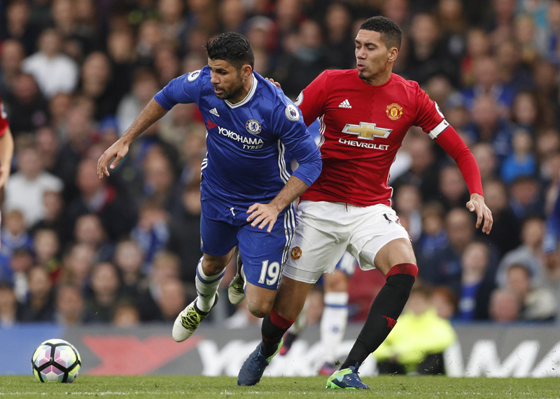Chelsea's Diego Costa in action with Manchester United's Chris Smalling. Photo: Reuters