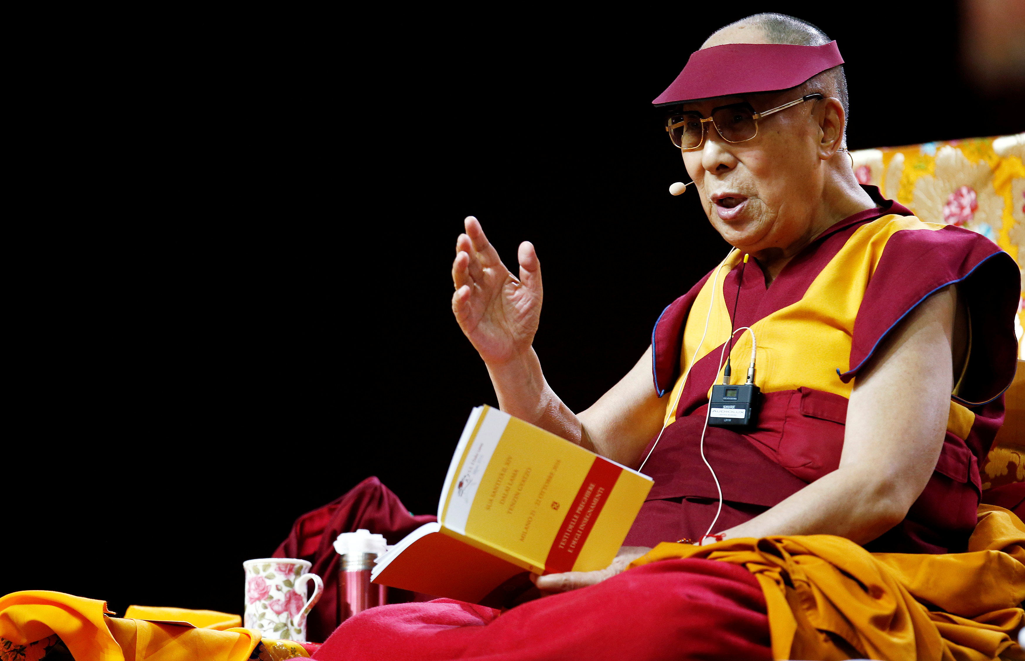 Tibet's exiled spiritual leader the Dalai Lama gestures during a teaching event in Milan, Italy October 21, 2016. REUTERS/Alessandro Garofalo
