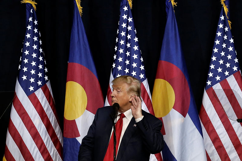 US Republican presidential nominee Donald Trump puts his hand to his ear as he speaks at a campaign rally in Pueblo, Colorado, US, October 3, 2016. Photo: Reuters