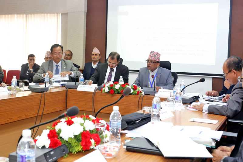 Nepal's Finance Secretary Shantaraj Subedi (centre) and Asian Development Bank's Deputy Director General Diwesh Sharan attending a Trilateral Review Meeting organised by the ADB at the Finance Ministry in Kathmandu, on Thursday, October 20, 2016. RSS