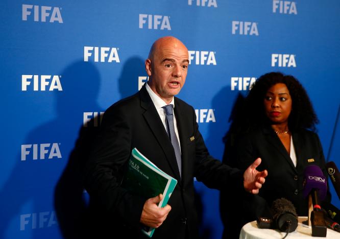 FIFA President Gianni Infantino and FIFA Secretary General Fatma Samoura address the media after a meeting of the FIFA Council at the FIFA headquarters in Zurich, Switzerland October 13, 2016.  REUTERS/Arnd Wiegmann