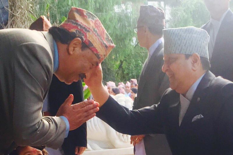 In this photo posted by Rastriya Prajatantra Party-Nepal Chairman Kamal Thapa on his Twitter, former King Gyanendra Shah is offering Dashain Tika to him, on Tuesday, October 11, 2016.