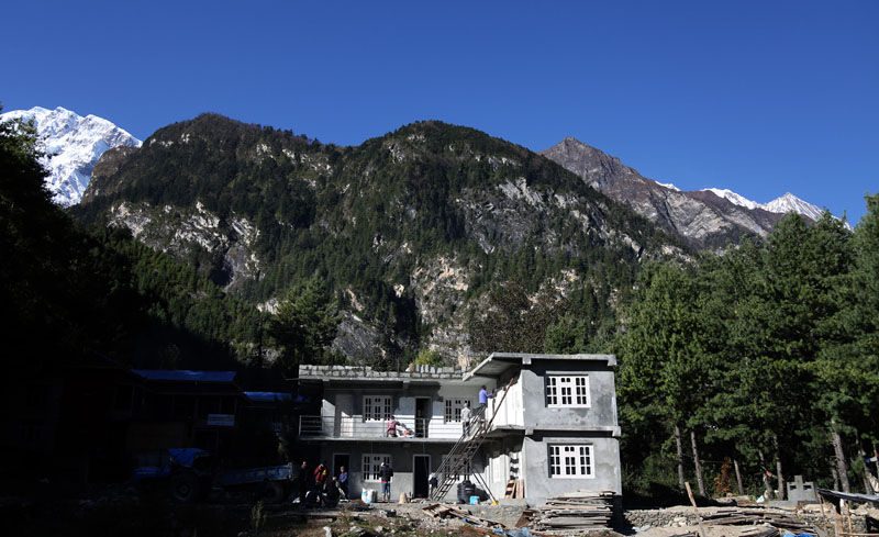 A hotel is under construction in Chame, the district headquarters of Manang district, on Saturday, October 29, 2016. The number of tourists visiting this trans-Himalayan district is increasing of late. Photo: RSS