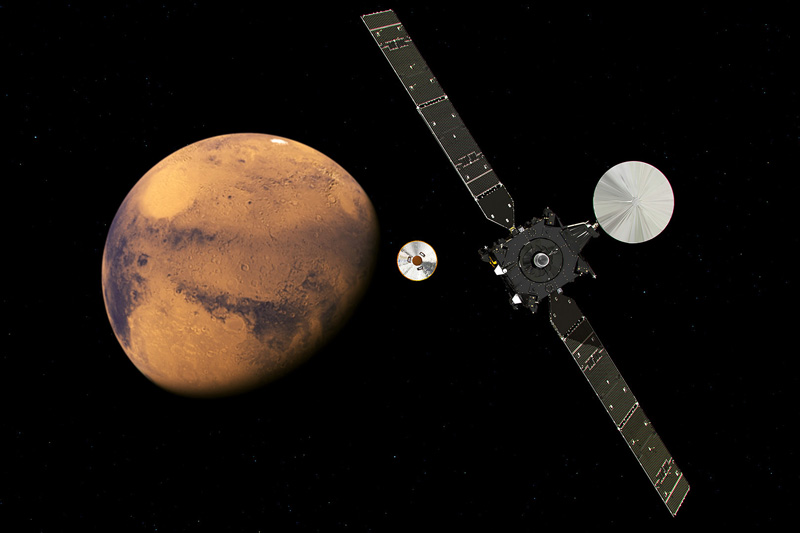 In this artist impression provided by the European Space Agency, ESA, the  ExoMars Trace Gas Orbiter, TGO, right, and its entry, descent and landing demonstrator module, Schiaparelli, center, approaching Mars. The separation was scheduled to occur on Sunday Oct. 16, about seven months after launch. Schiaparelli is set to enter the martian atmosphere on Wednesday, Oct. 19, 2016 while TGO will enter orbit around Mars. Photo: AP