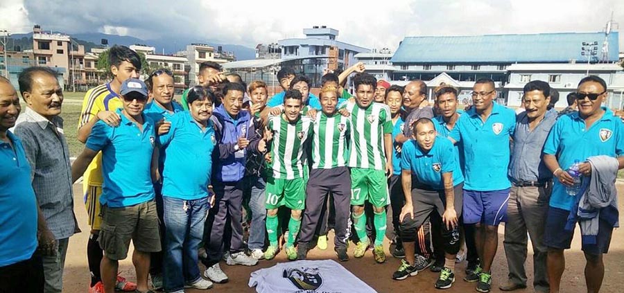NRT players and officials pose for photograph after ensuring the club's promotion to A Division. Photo: ANFA