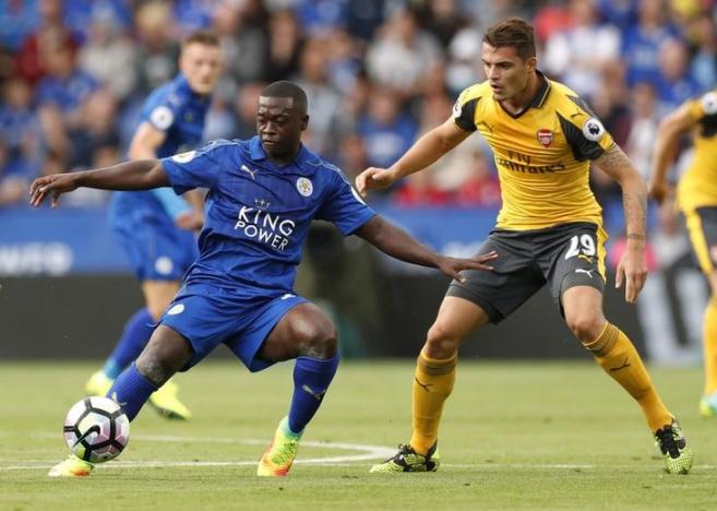 Britain Soccer Football - Leicester City v Arsenal - Premier League - King Power Stadium - 20/8/16nLeicester City's Nampalys Mendy  in action with Arsenal's Granit XhakanAction Images via Reuters / John Sibley/Livepic/ Files