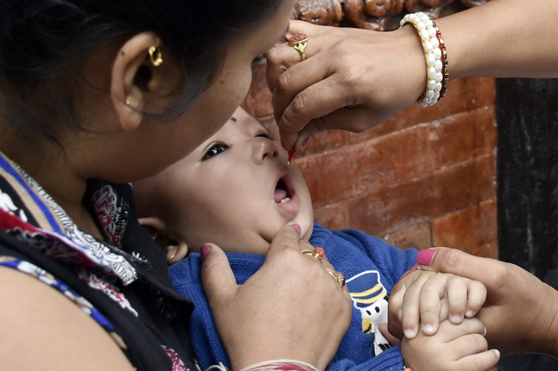 FILE - A child being administered vitamin A drops during the National Vitamin A programme, at Basantapur, Kathmandu, on Wednesday, October 19, 2016. Photo: THT