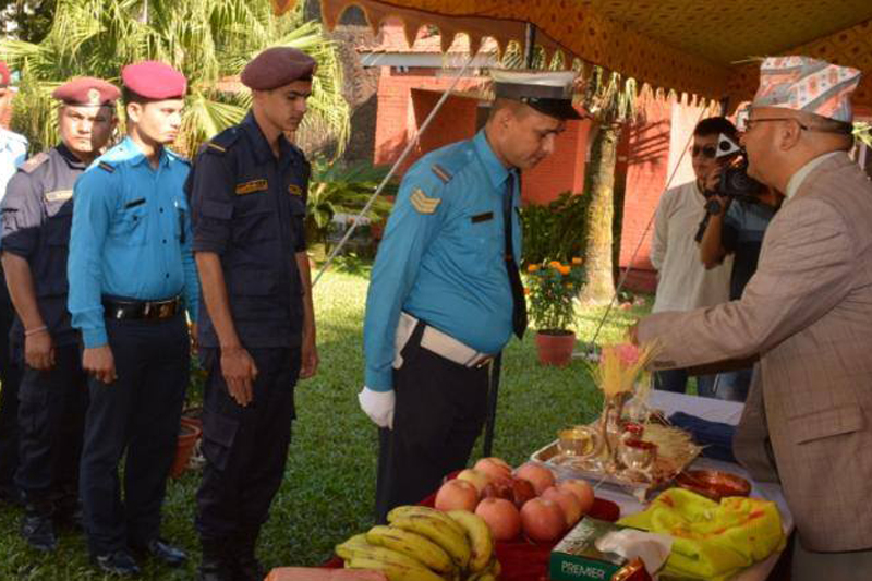 Inspector General of Nepal Police Upendra Kant Aryal offers Dashain Tika to police officials and personnel, in Kathmandu, on Wednesday, October 12, 2016. Photo: Nepal Police