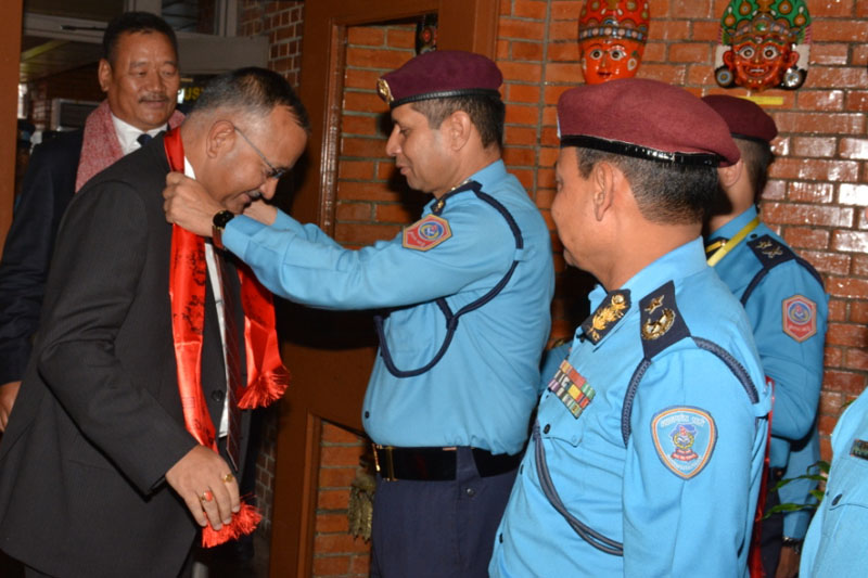 Senior police officials welcome Inspector Generals of Nepal Police and Armed Police Force, Upendra Kant Aryal and Durja Kumar Rai, as they return from the IACP Annual Conference and Exposition, at the Tribhuvan International Airport, on Friday, October 21, 2016. Photo: Nepal Police