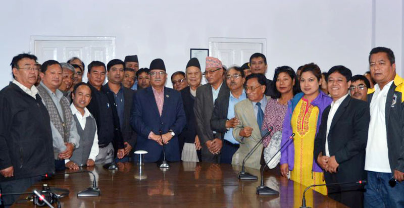 Prime Minister Pushpa Kamal Dahal receives a delegation representing the Nepal Sambat 1137 New Year National Event Organising Committee at Baluwatar in Kathmandu, on Monday, on October 24, 2016. Photo: PM's Secretariat.