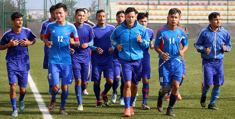 National football team players jog during a training session at the ANFA Complex in Lalitpur on Sunday, October 16, 2016. The team is preparing for the AFC Solidarity Cup to be held in Malaysia in November. Photo courtesy: ANFA