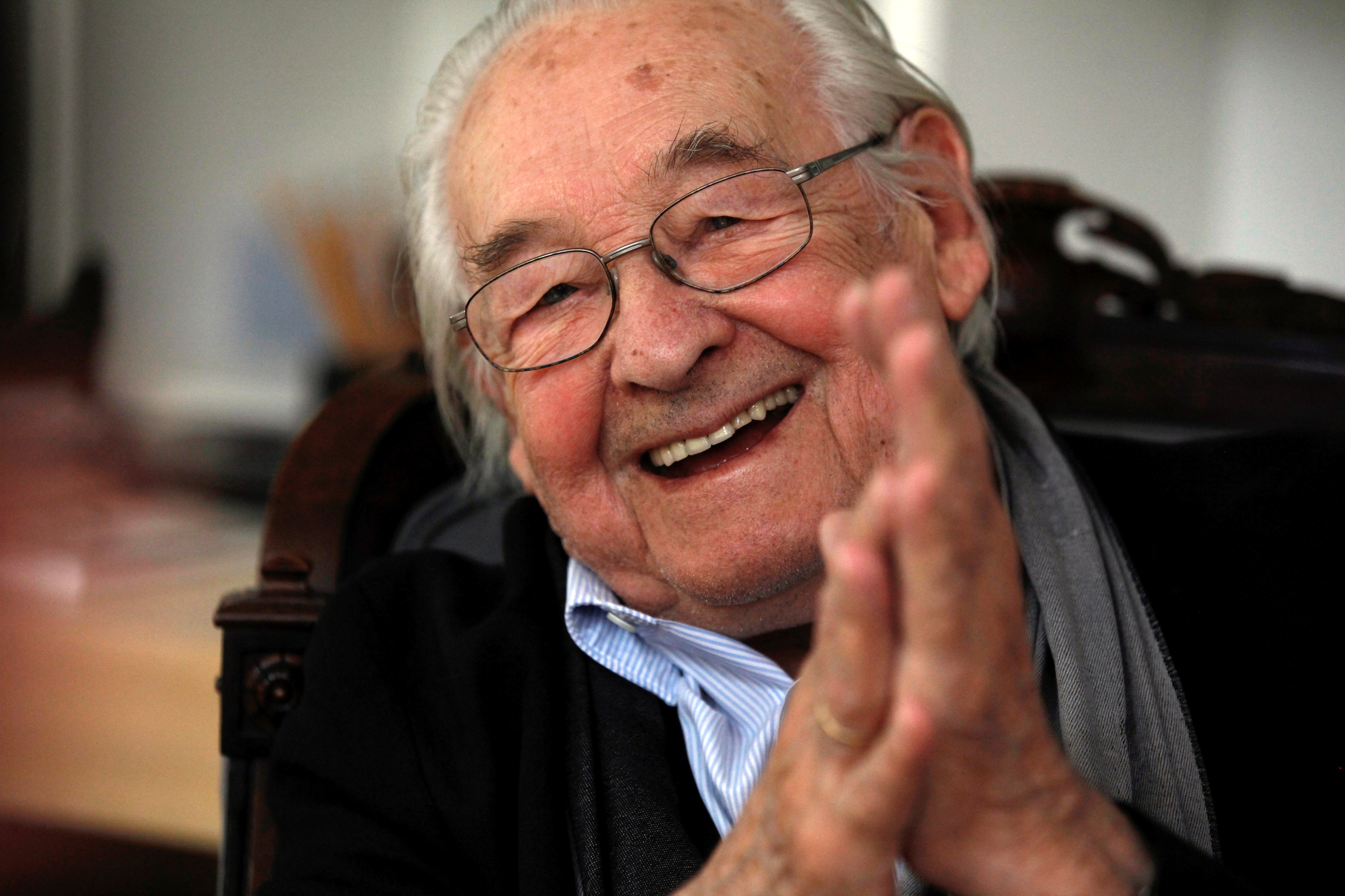 Oscar-winning Polish film director Andrzej Wajda smiles as he speaks to Reuters during an interview at Akson Studio office in Warsaw, on August 13, 2013. Photo: Reuters/ File