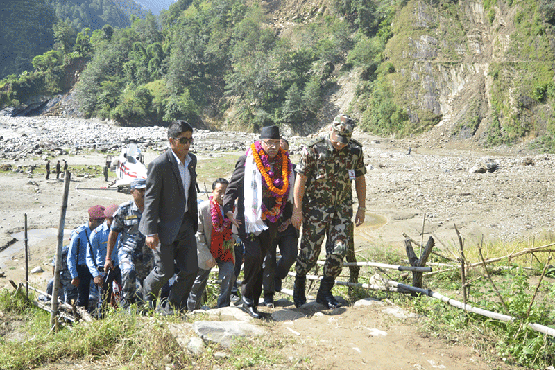 Prime Minsiter Pushpa Kamal Dahal heading to Lung VDC to inspect the landslide-hit areas in Pyuthan district on Saturday, October 1, 2016. Photo: PMu2019s Secretariat 