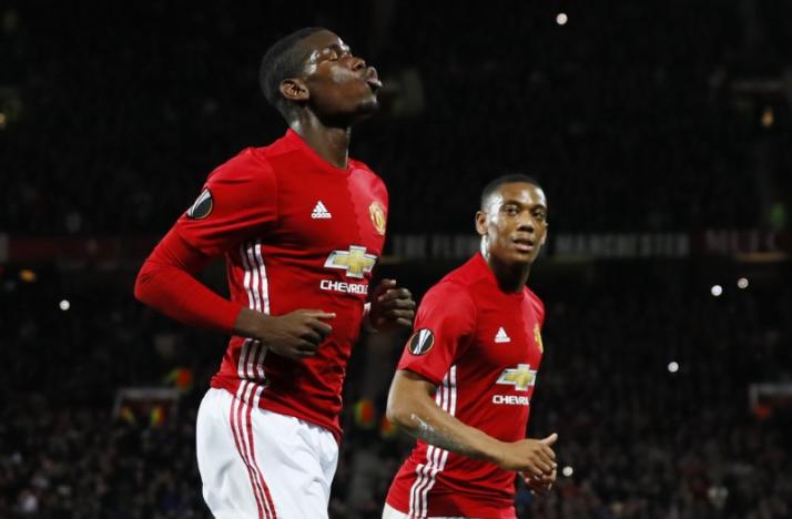 Britain Football Soccer - Manchester United v Fenerbahce SK - UEFA Europa League Group Stage - Group A - Old Trafford, Manchester, England - 20/10/16nManchester United's Paul Pogba celebrates scoring their first goal from the penalty spot with Anthony Martial nAction Images via Reuters / Jason CairnduffnLivepic