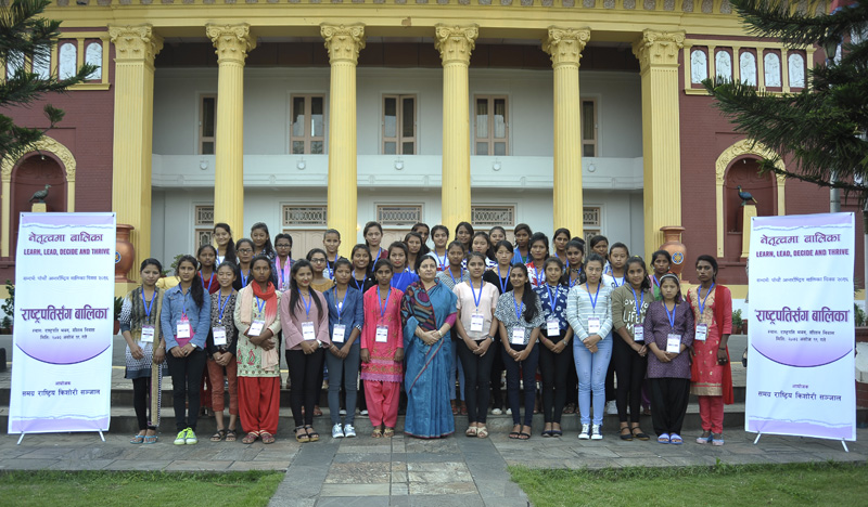 Girl children pose for a photograph with President Bidya Devi Bhandari at a function organised on the occasion of International Day of Girl Child, at the Sheetal Niwas, on Wednesday, October 5, 2016. Photo: President's Office