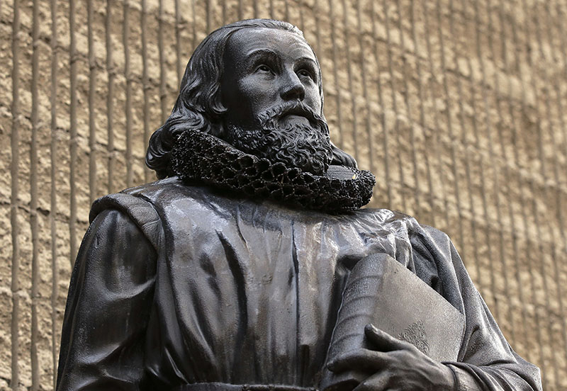 A 19th century bronze statue of Puritan John Winthrop, by sculptor Richard Saltonstall Greenough, stands outside the First Church in Boston, in Boston's Back Bay neighborhood, on Thursday, October 20, 2016. Photo: AP