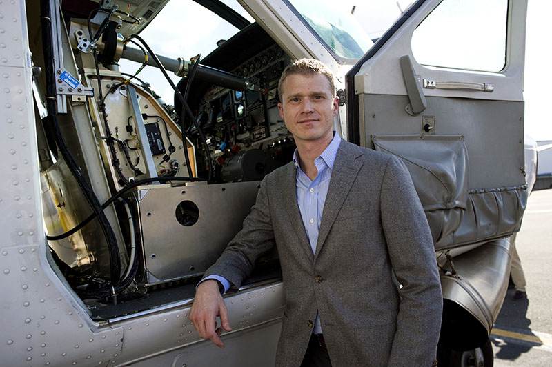Dan Patt, Program Manager, Tactical Technology Office, Aurora Flight Sciences, stands next to the firms Aircrew Labor In-Cockpit Automantion System (ALIAS), which is mounted in the co-pilot seat of a Cessena Caravan aircraft, at Manassas Airport in Manassas, Virginia, on Monday, October 17, 2016. Photo: AP