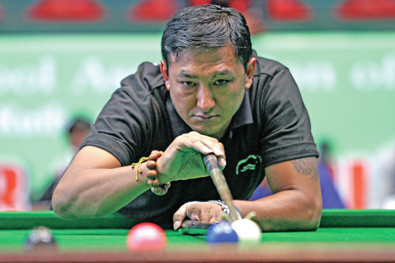 Sanjay Mulmi plays a shot during the Nepal Open Snooker Championship, in Kathmandu, on Friday, October 21, 2016. Photo: THT