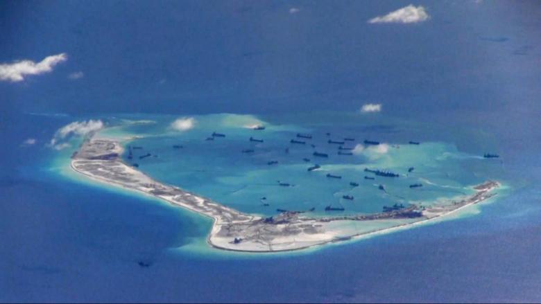 Chinese dredging vessels are purportedly seen in the waters around Mischief Reef in the disputed Spratly Islands in the South China Sea in this still image from video taken by a P-8A Poseidon surveillance aircraft provided by the United States Navy May 21, 2015. U.S. Navy/Handout via Reuters
