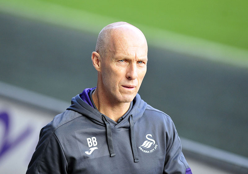Swansea City Manger Bob Bradley walks beside the pitch before the English Premier League soccer match between Swansea City and Watford at the Liberty Stadium, Swansea, Wales, on Saturday, October 22, 2016. Photo: Simon Galloway/PA via AP